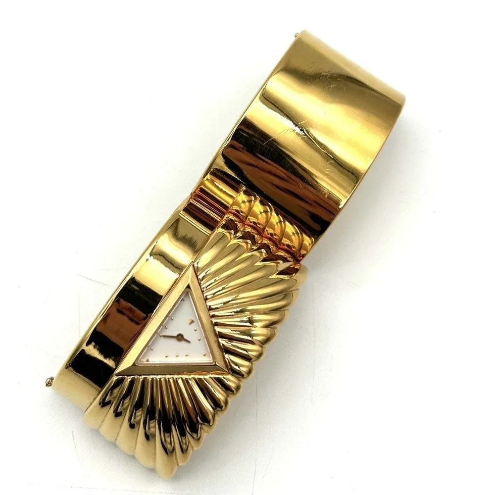 Vintage 80s The Franklin Mint Women's Gold Tone Ribbed Cuff Bracelet Watch 1988